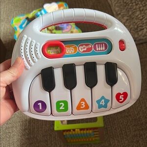 Interactive White and Black Learning Toy with Ergonomic Design